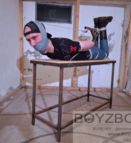 ... to make your massive tape gag tighter and your hogtie very strict, bitch !